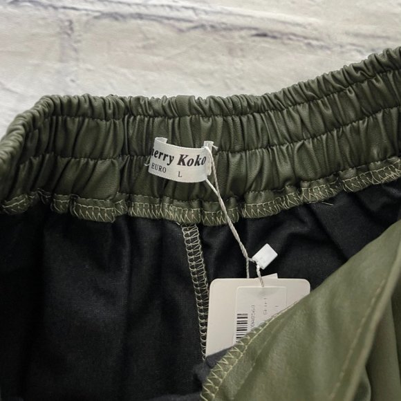 Cherry Koko Pleat Yourself Faux Leather Mini Skirt - Picture 5 of 9